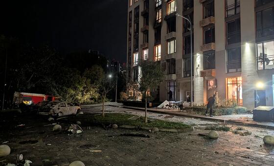 The aftermath of a drone attack in a residential area in Kyiv on 12 October.